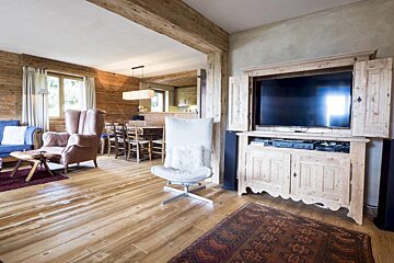 A living room with a large flat screen tv