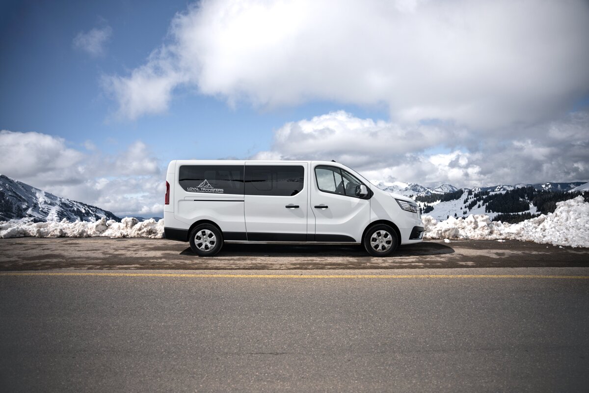 A white van with the word mountain on the side