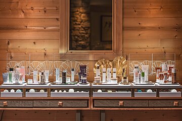 A display of various beauty products including sisley
