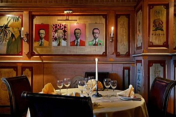 A dining room with chinese writing on the wall