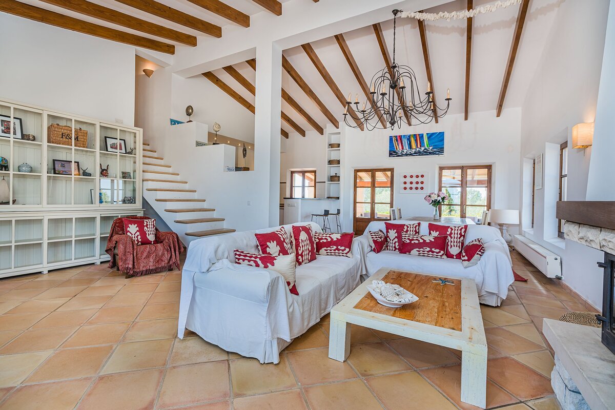 A living room with a couch and a coffee table