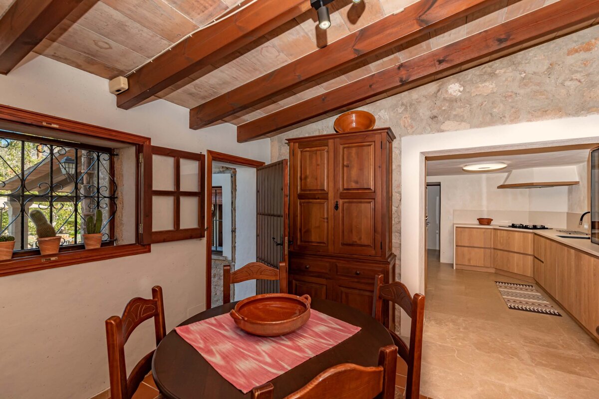 A dining room table with a bowl on it
