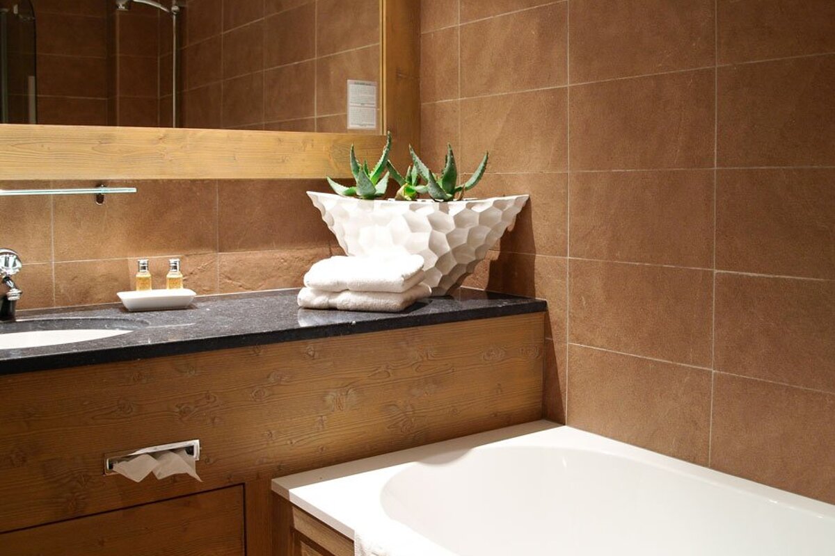 A bathroom with a sink and a bathtub