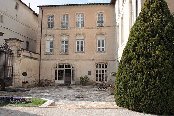 the exterior of an old mansion