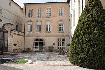the exterior of an old mansion