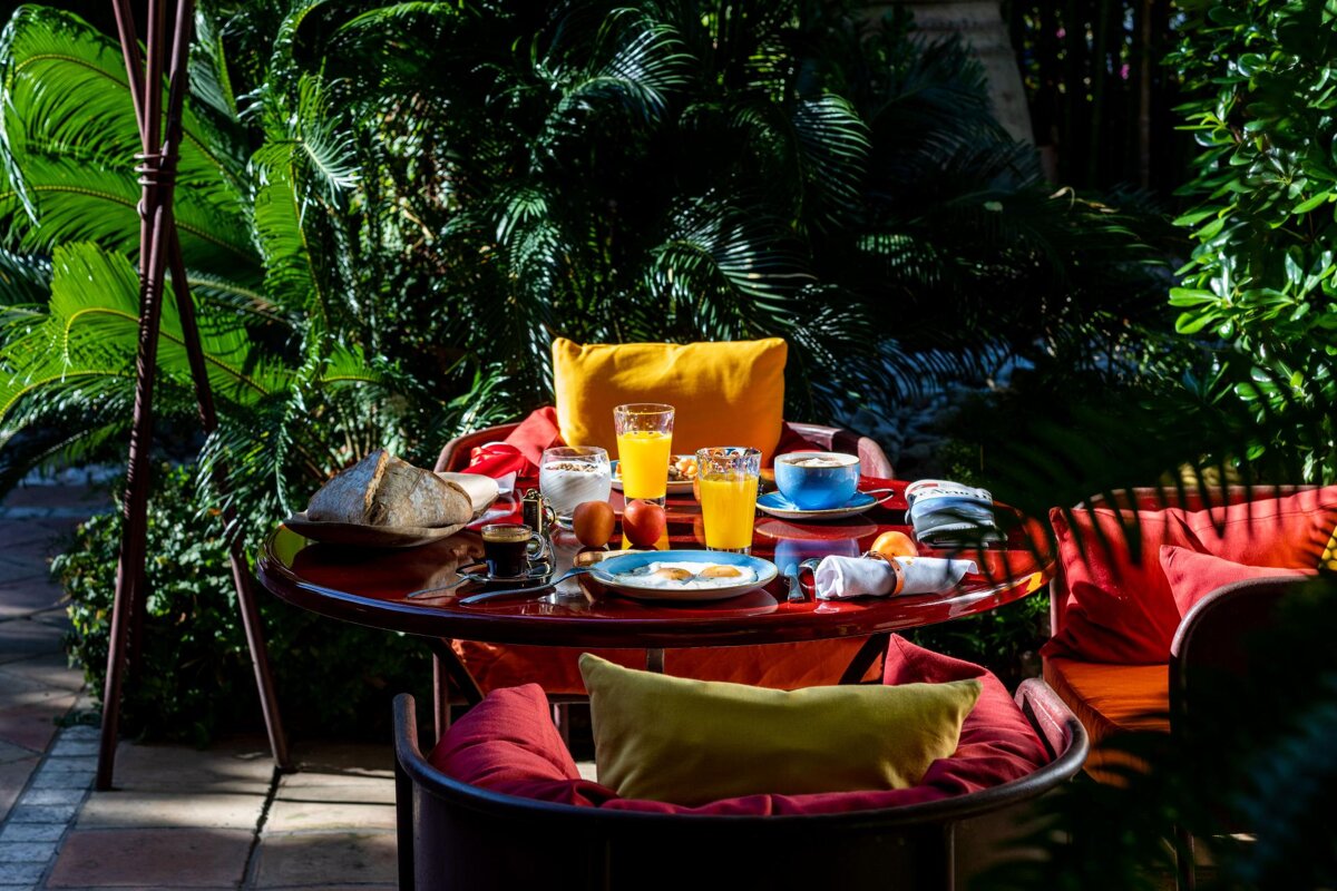 A table with a variety of food and drinks on it