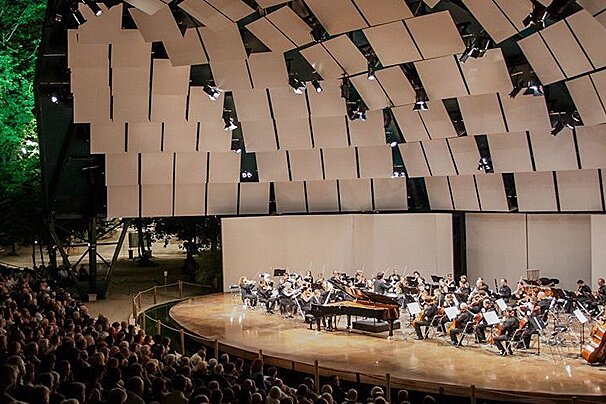 a stage with musicians