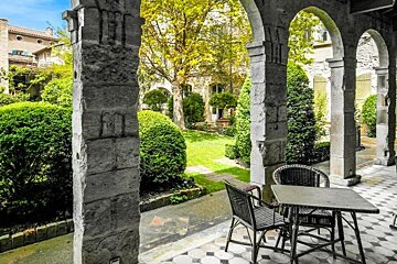 tables and chairs in the cloister