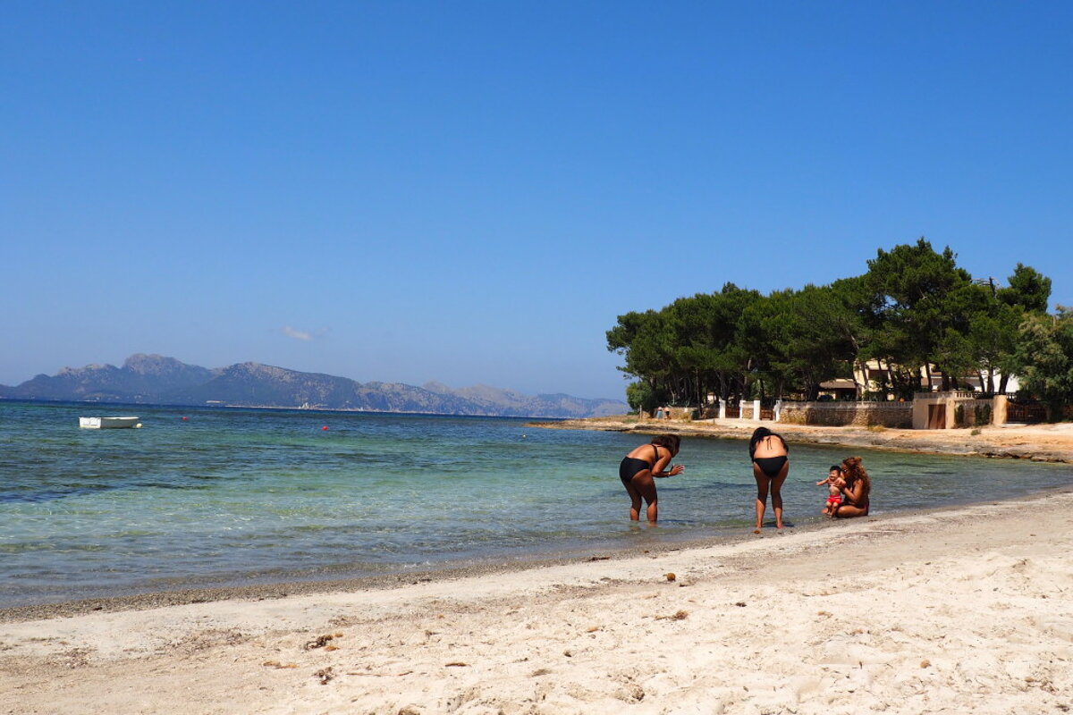 an almost empty beach in mallorca