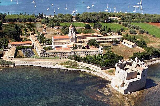 An aerial view of a castle surrounded by water