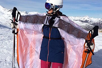 a skier with a wing