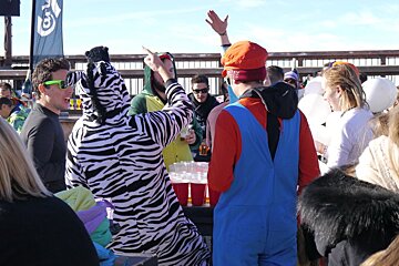 people in zebra outfits