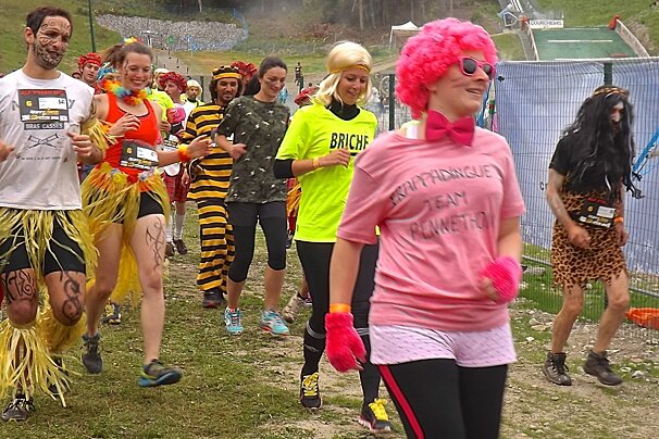 people in fancy dress in a race in courchevel 