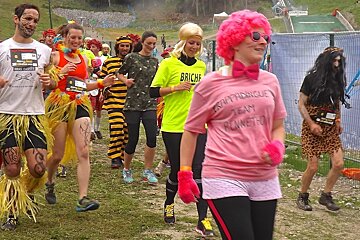people in fancy dress in a race in courchevel