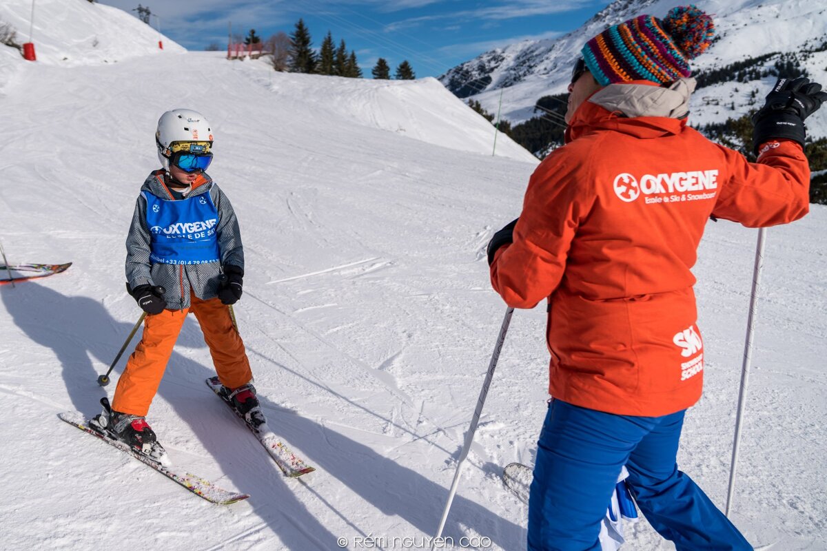 a ski instructor giving a private lesson