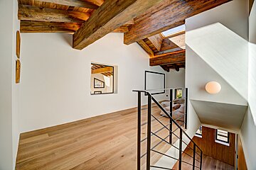 A staircase leading up to the second floor of a house
