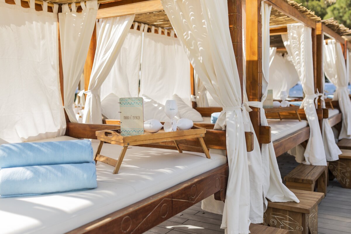 A canopy bed with a sign that says