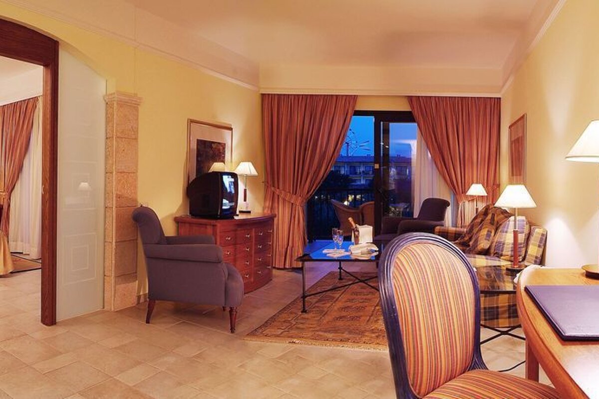 a picture of a hotel suite at Mallorca Palace Luxury Hotel, Sa Coma