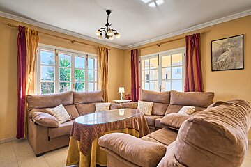 A living room with two couches and a table
