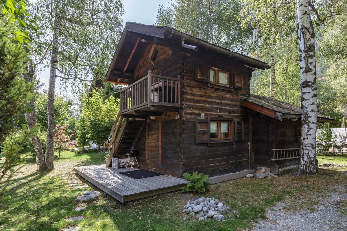 A small wooden cabin with the number 8 on the side