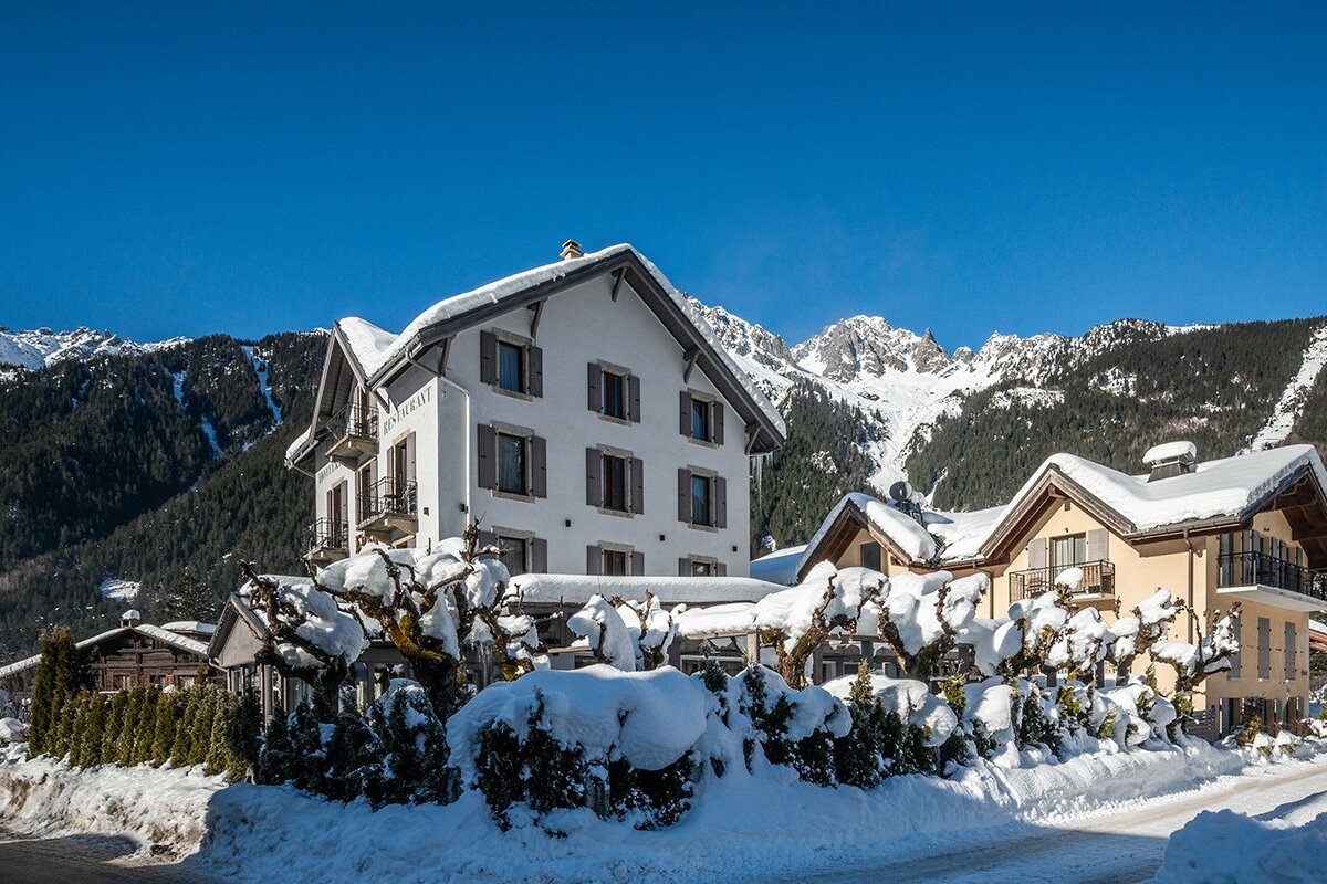 A white building with the word eden on it