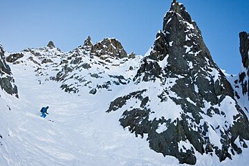 a skier in a small gully