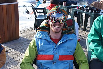 a man in brightly coloured ski gear