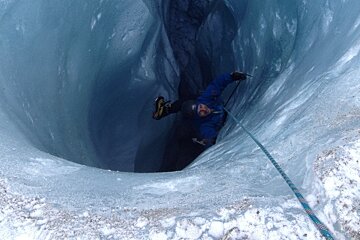 a man ice climbing in chamonix
