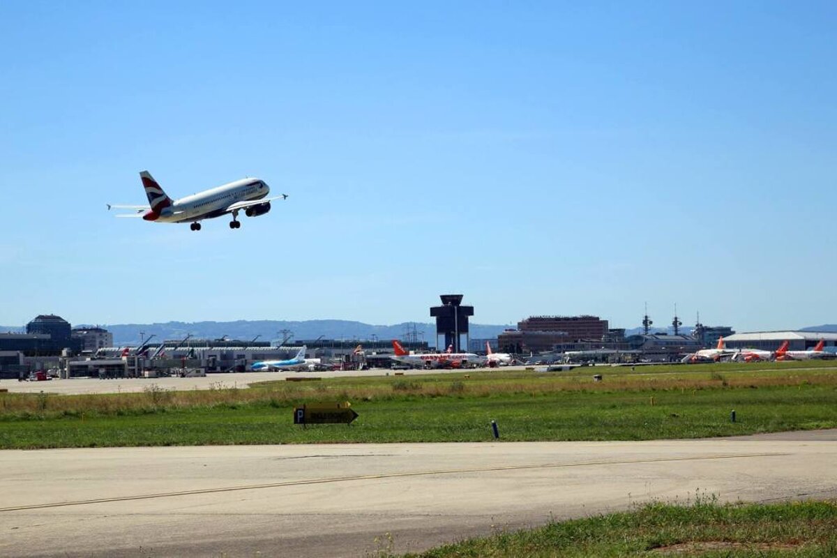 a plane taking off at geneva