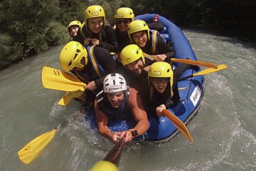 rafting down a white water river