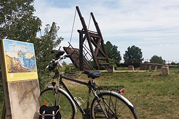 an old bridge and a bike 