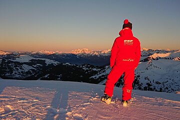 a ski instructor giving a private lesson
