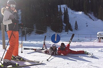 a ski instructor giving a private lesson