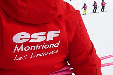 a ski instructor giving a private lesson