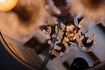 A chandelier with a lot of crystals hanging from it