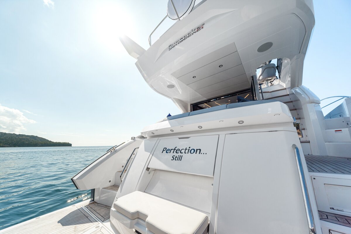 The back of a white yacht says perfection still