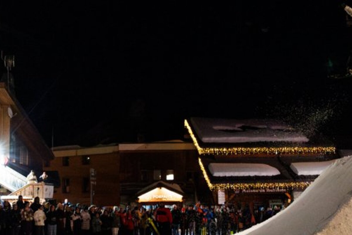 snowboard and ski contest at night