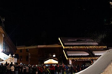 snowboard and ski contest at night