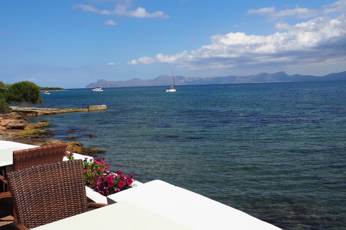 a restaurant table overlooking the sea