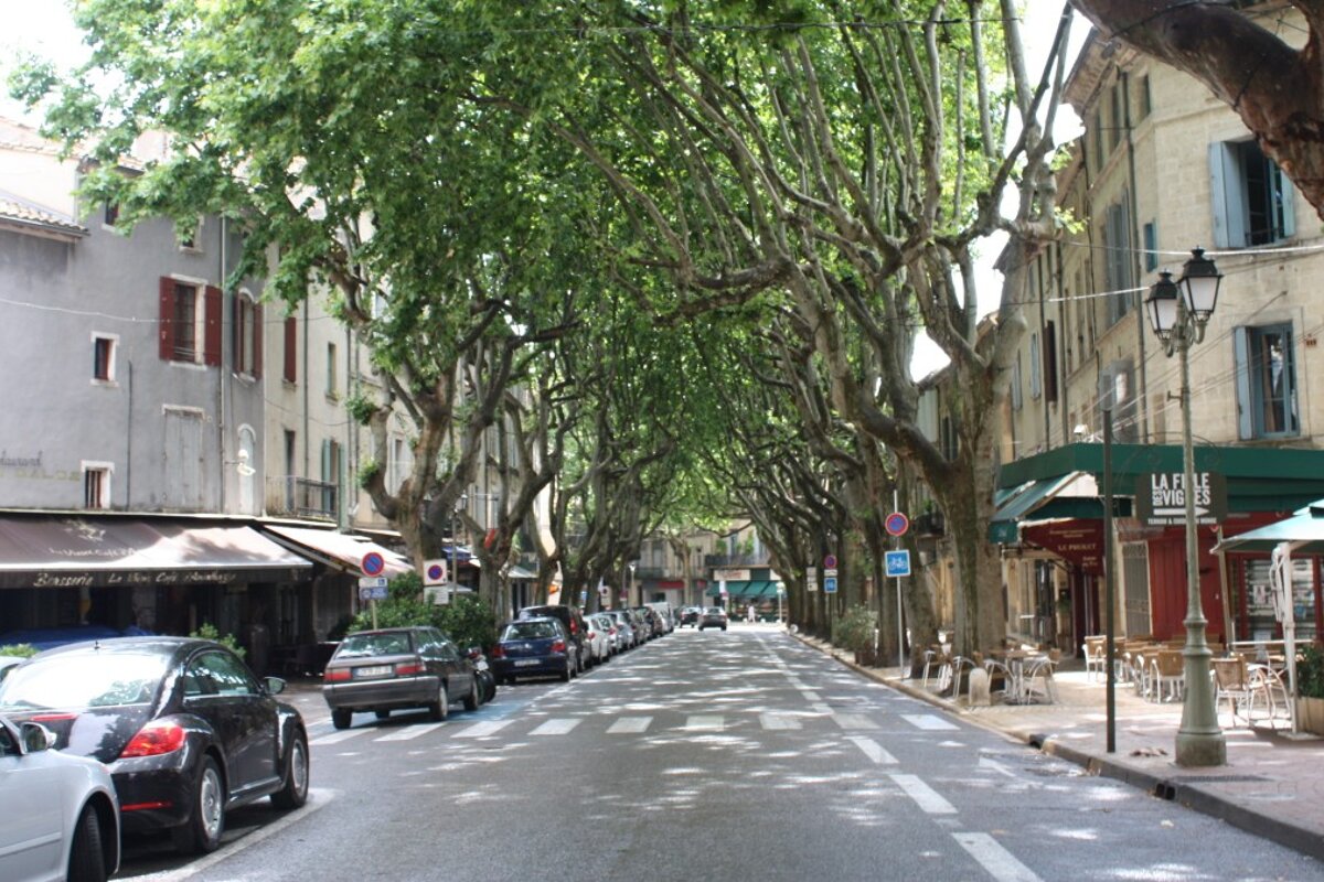 a main street in a town in provence