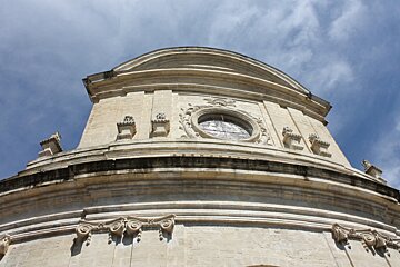 a road lined with trees in Provence