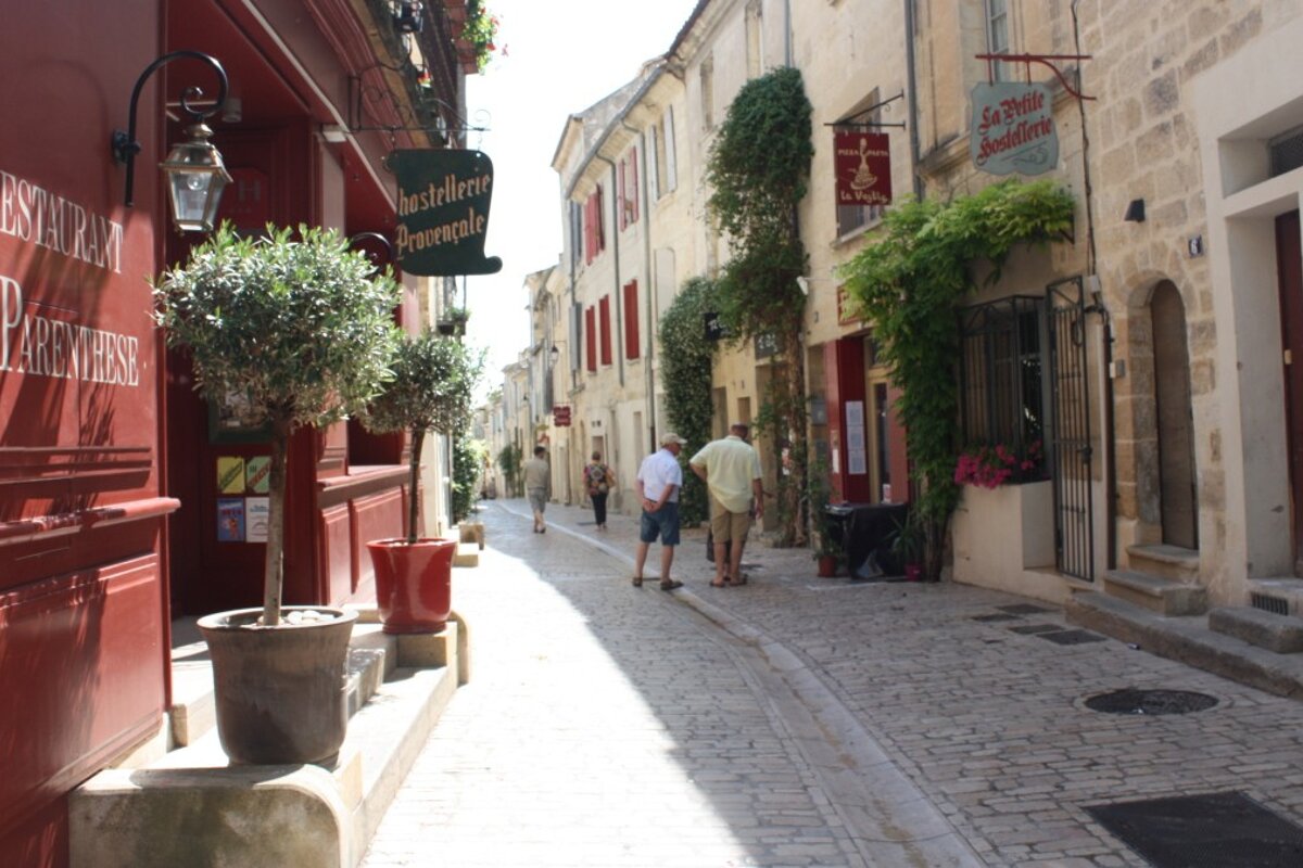 a narrow cobbled street in provence