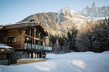 a chalet with mountain views