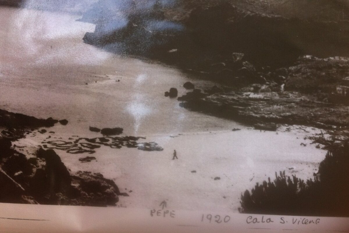 an old black and white picture of the beach
