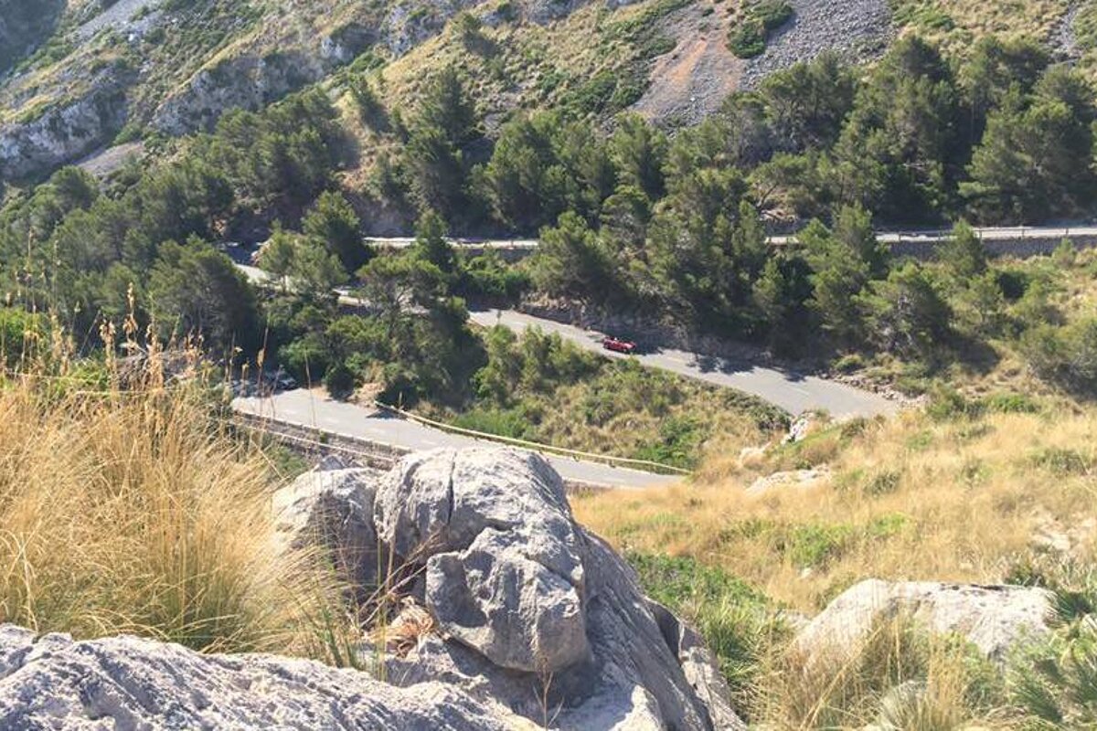 cars on a small bendy road in majorca
