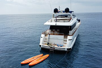 A large yacht called lizard is floating in the ocean