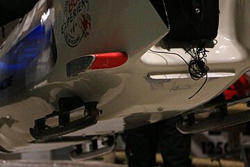 a sled being lowered on the ice