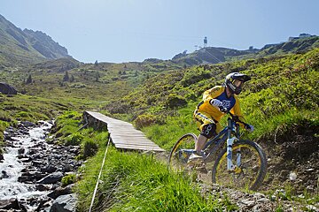 a mountain biker on a trail in verbier