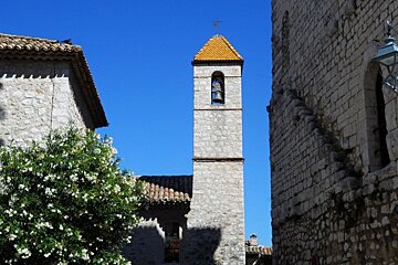 a bell tower with a tiled roof
