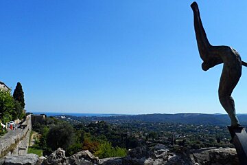 a statue on the towns walls of st paul de vence in nice
